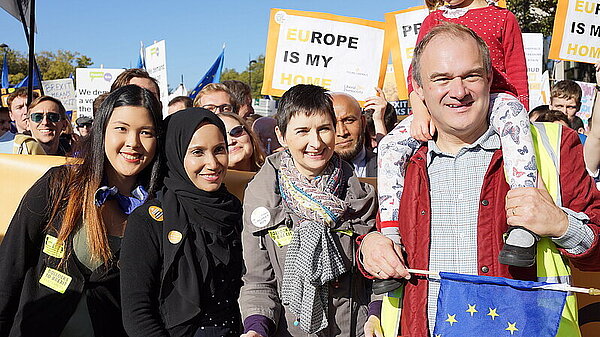 Ed Davey, Caroline Pidgeon in front of crowd